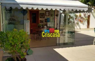 Encantadora residência com 3 quartos, área gourmet e vaga náutica em condomínio exclusivo