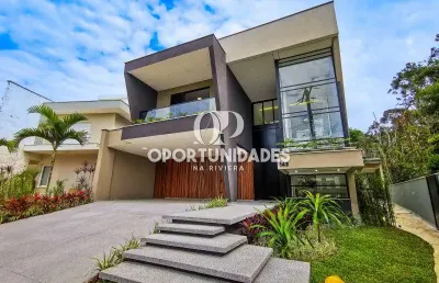 Casa à venda com 460m² de área construída, 5 suítes, em riviera de são lourenço bertioga sp.