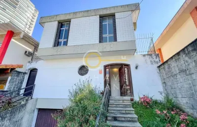 Casa com 4 dormitórios para alugar, 386 m² por r$ 12.000,00/mês - boqueirão - santos/sp