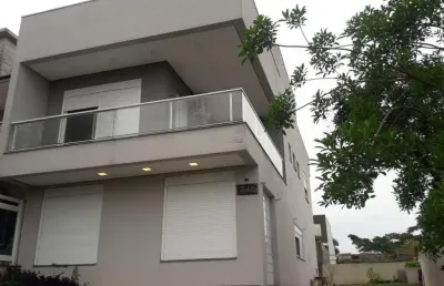 Casa em condomínio fechado com 3 quartos à venda na rua silvino nedel, 240, alto petrópolis, porto alegre por r$ 960.000