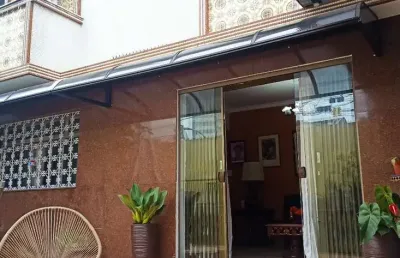 Casa com 3 quartos à venda na delphin moreira, 27, embaré, santos, 145 m2 por r$ 1.700.000