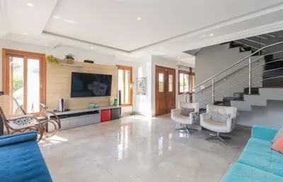 Casa em condomínio fechado com 3 quartos à venda na rua deputado hugo mardini, 1780, passo das pedras, porto alegre, 261 m2 por r$ 1.550.000