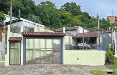 Casa com 3 quartos à venda na avenida vicente monteggia, 2406, vila nova, porto alegre, 156 m2 por r$ 495.000