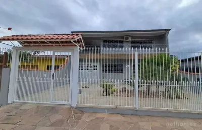 Casa com 3 quartos à venda na rua gaspar martins, 894, americana, alvorada, 186 m2 por r$ 550.000