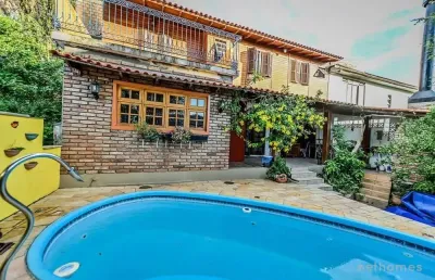 Casa em condomínio fechado com 4 quartos à venda na das figueiras, 108, santa tereza, porto alegre, 200 m2 por r$ 650.000