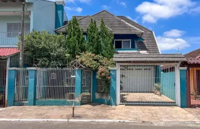 Casa com 4 quartos à venda na rua senador salgado filho, 660, são luis, canoas, 300 m2 por r$ 780.000