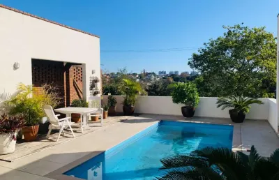 Casa com 3 quartos à venda na walter kaufman, 372, jardim planalto, porto alegre, 260 m2 por r$ 1.280.000