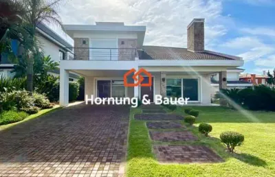 Casa mobiliada e decorada à venda em xangri-lá, centro - condomínio playa vista