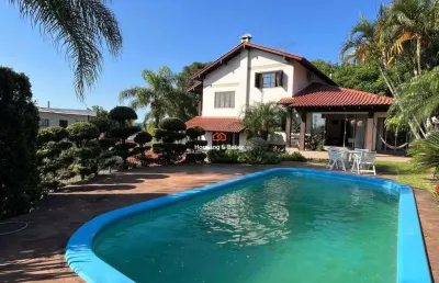 Belíssima casa com piscina à venda em novo hamburgo - bairro primavera