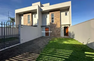 Sobrado no bairro união com pátio amplo nos fundos.