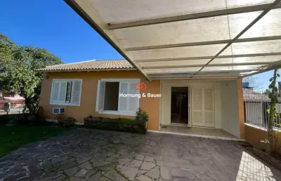 Casa à venda em novo hamburgo, vila nova - com churrasqueira, suíte e pátio