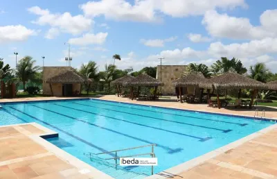 Terreno condomínio alphaville natal lote padrão com 460,35m2 nascente  ventilado