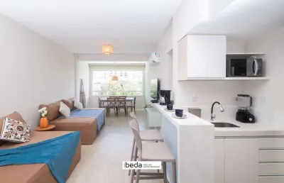Apartamento venda 1 dormitório 60m2  mobiliado na avenida beira mar com vaga