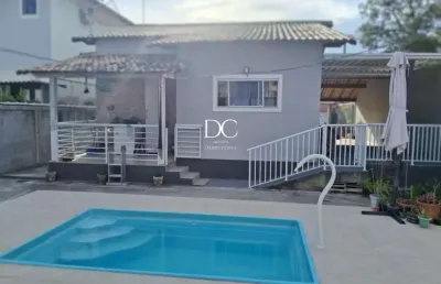 Casa com 4 quartos à venda na rua das azaléias, mumbuca, maricá por r$ 650.000