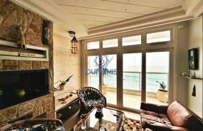 Apartamento reformado à venda na praia das astúrias - frente mar
