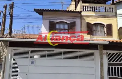 Descubra o conforto de morar na vila galvão com esta encantadora casa à venda!