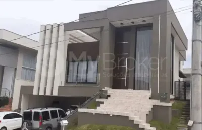 Casa com 4 quartos, 4 suítes, 2 banheiros, e 3 vagas de garagem. codigo: 13712