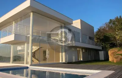 Casa em condomínio fechado com 3 quartos à venda na Rodovia Haroldo Soares Glavan, Cacupé, Florianópolis