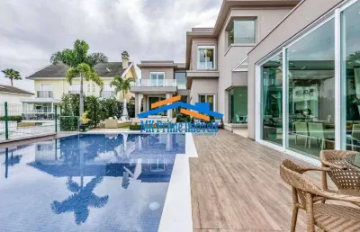 Linda casa com 5 suítes e 3 vagas - condomínio alphaville residencial 10.