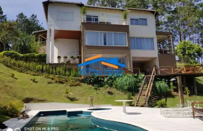 Linda casa em condomínio refúgio dos pinheiros 4 suítes!