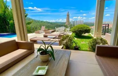 Casa espetacular com 5 suítes em tamboré 10: luxo e comodidade garantidos!