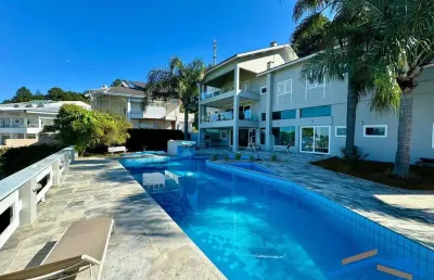 Casa à venda em alphaville, residencial 10 - 6 suítes, escritório, piscina.