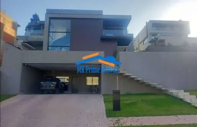 Casa contemporânea e sofisticada com 4 quartos e 5 banheiros, 415 m²