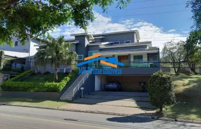 Casa em condomínio com 400m²  a.c com  04 quartos, 03 suítes- tarumã.