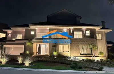 Casa em condomínio com 5 suítes para locação no tamboré 2.