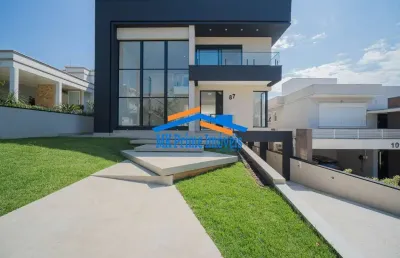 Linda casa com 4 suítes no condomínio reserva santa maria/granja viana!