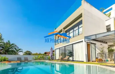 Casa luxuosa com 3 piscinas no eco boulevard - jardim petropólis/sp.