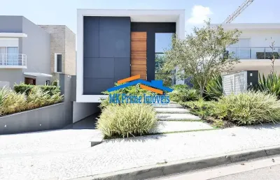 Linda casa com 4 suítes no condomínio lorian boulevard!