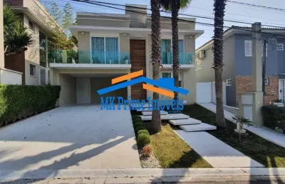 Casa luxuosa com 4 suítes, piscina e 6 vagas - residencial 3.