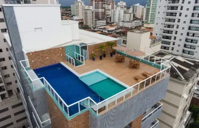 Lindo apto com 104 m2 á venda, 03 dormitório sendo 01 suíte, sala, cozinha planejada, 02 vaga na vila guilhermina - praia grande - sp