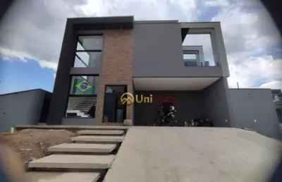 Sobrado com 4 dormitórios, 210 m² - venda por r$ 1.800.000,00 ou aluguel por r$ 8.580,00/mês - condomínio reserva aruanã - são josé dos campos/sp