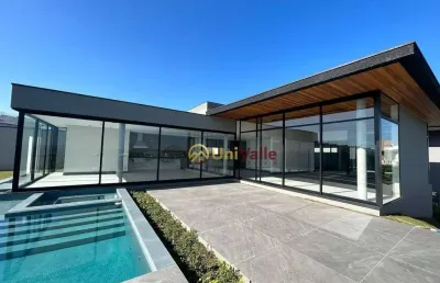 Casa com 4 dormitórios à venda, 600 m² por r$ 6.450.000,00 - condomínio reserva do paratehy - são josé dos campos/sp