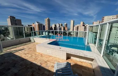 Apartamento em praia grande  aviação 2 quartos sendo uma suíte, garagem, piscina