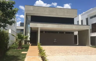 Luxuosa residência com 4 suítes e área gourmet integrada à venda em alphaville nova esplanada 1
