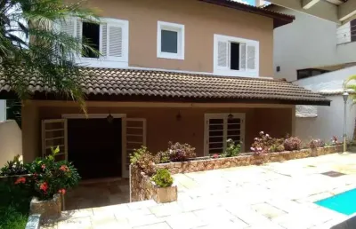 Casa luxuosa em alphaville 5 - santana de parnaíba/sp, frente à praça, com 4 quartos e lazer completo