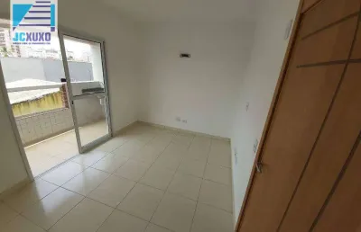 Apartamento com 2 dormitórios à venda, 55 m² por r$ 285.000,00 - caiçara - praia grande/sp