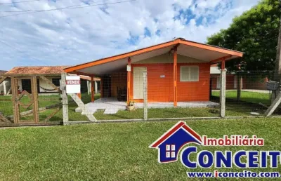 C879 - residência de madeira em região de moradores no balneário presidente
