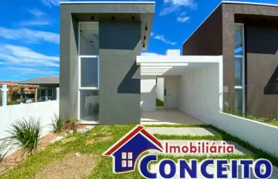 G1016 - excelente geminado em localização privilegiada no centro de imbé