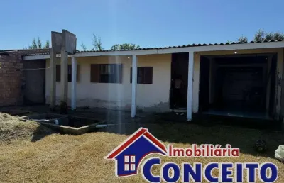 C83 - residência de alvenaria localizada em região de moradores