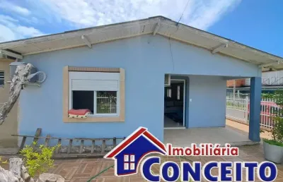 C1000 - residência composta de 03 dormitórios localizada no centro de imbé