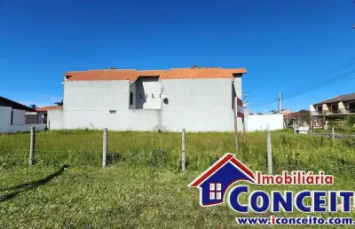 T1045 - excelente terreno de esquina medindo 435m² no centro de imbé