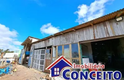 C401 - imóvel de madeira localizado em região de moradores