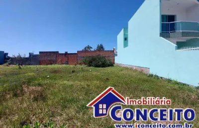 T86 - excelente terreno medindo 420 m² no centro de imbé