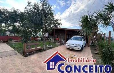 C164 - linda residência de esquina localizada no balneário albatroz