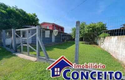 C374 - residência localizada em região de moradores no balneário ipiranga