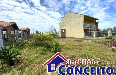 T26 - terreno medindo 300m² a 50 metros do mar localizado em mariluz